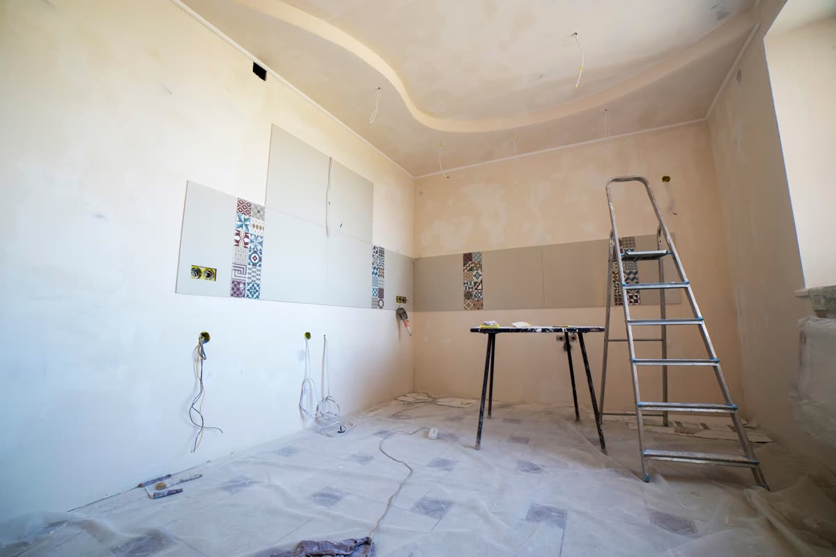 Room mid-renovation with custom wall finish samples
